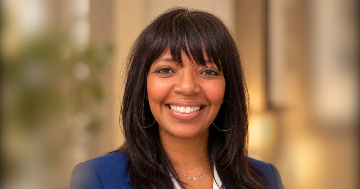 Teratha Williams, founder of HR4HR Consulting, smiling in a blue blazer